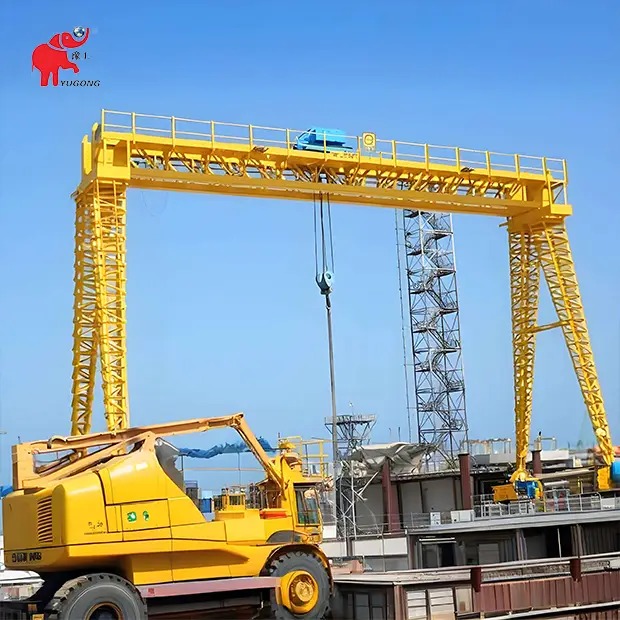 Козловой башенный кран MG